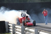 Red Altered Drag Car doing burnout